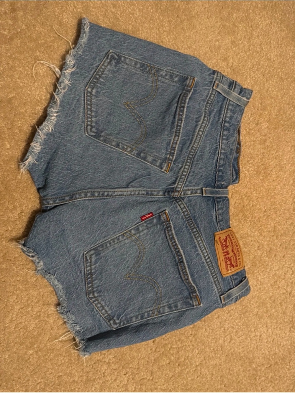 Levi's Medium Blue Denim Cutoff Shorts with Frayed Hem
